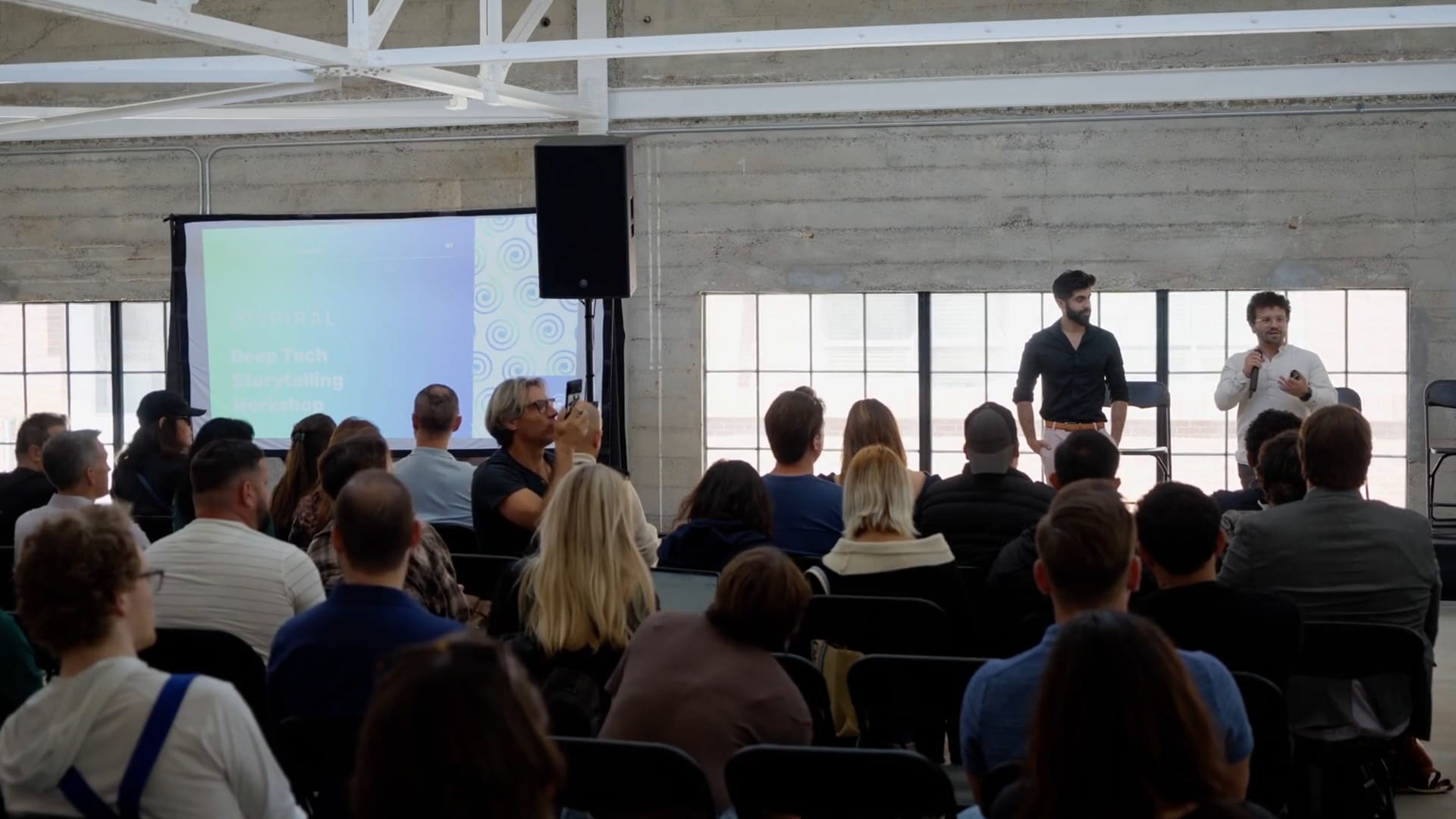 A full room of founders at a Spiral Studios storytelling workshop.